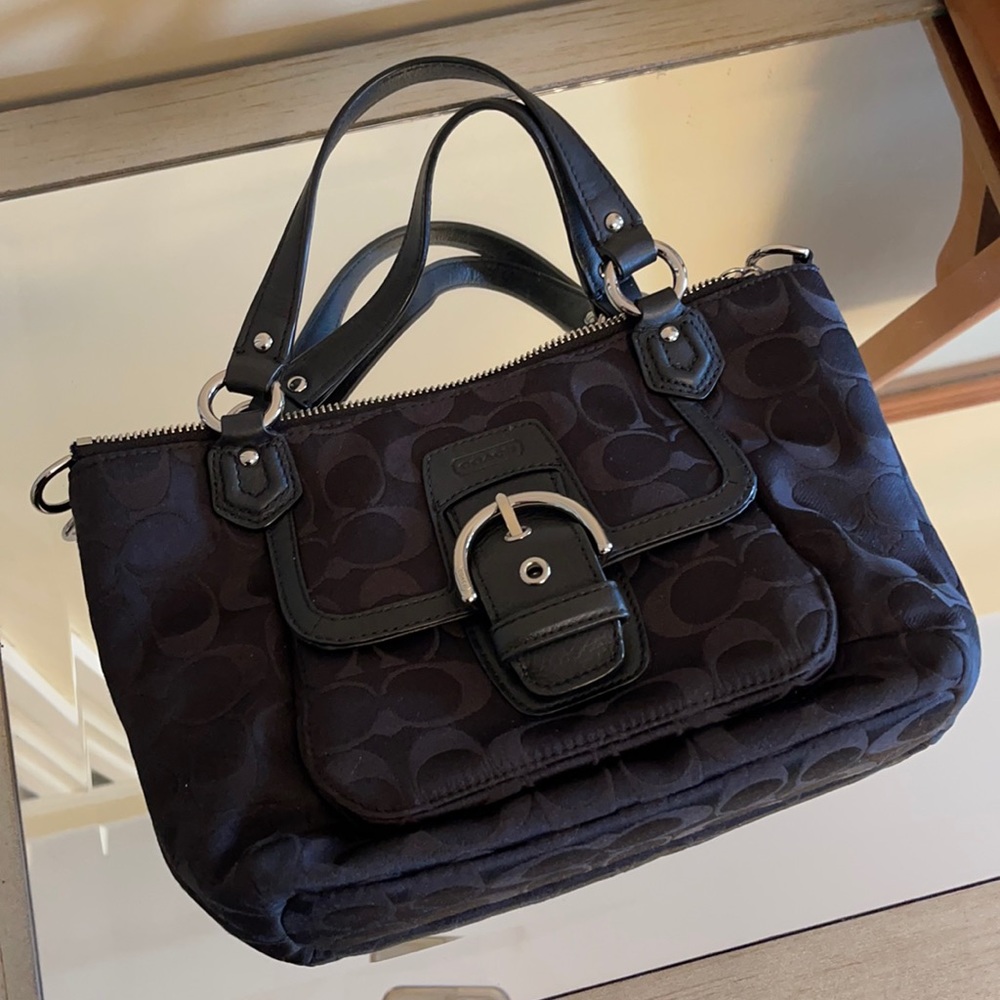Black mini logo large c Coach tote.